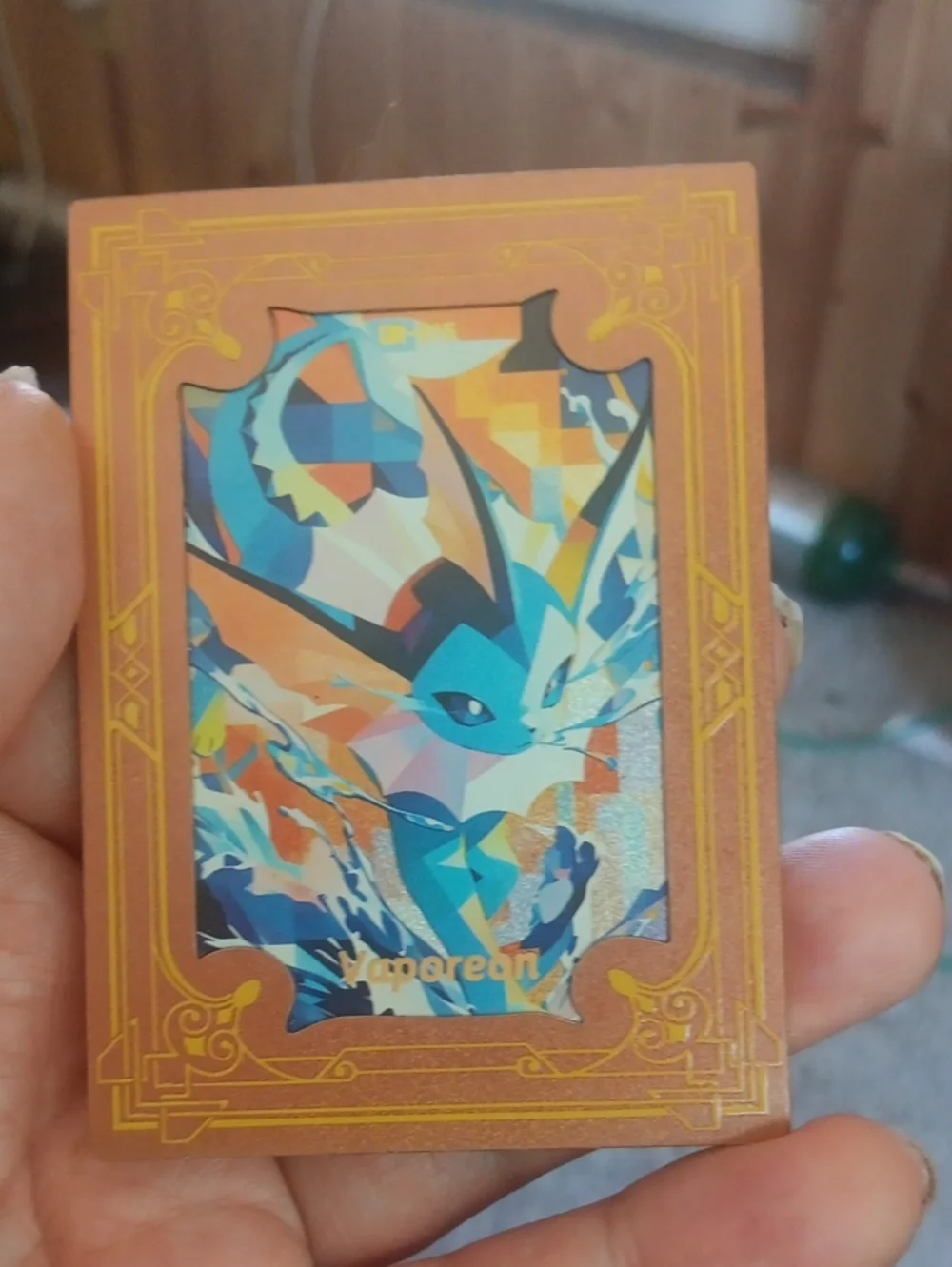 Pokemon Vaporeon Trading Card - Blue, Orange, Yellow